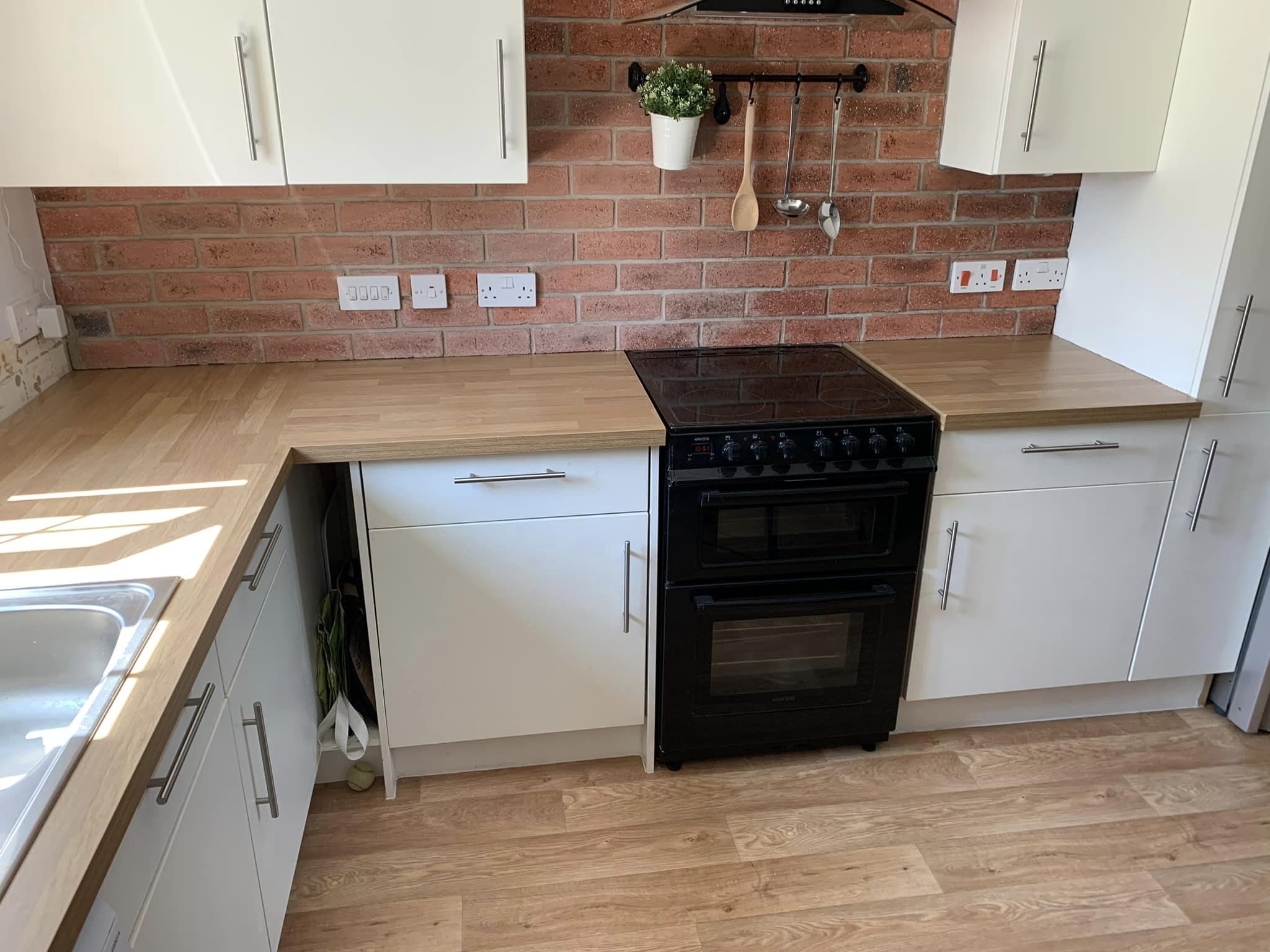 Plastered island in kitchen